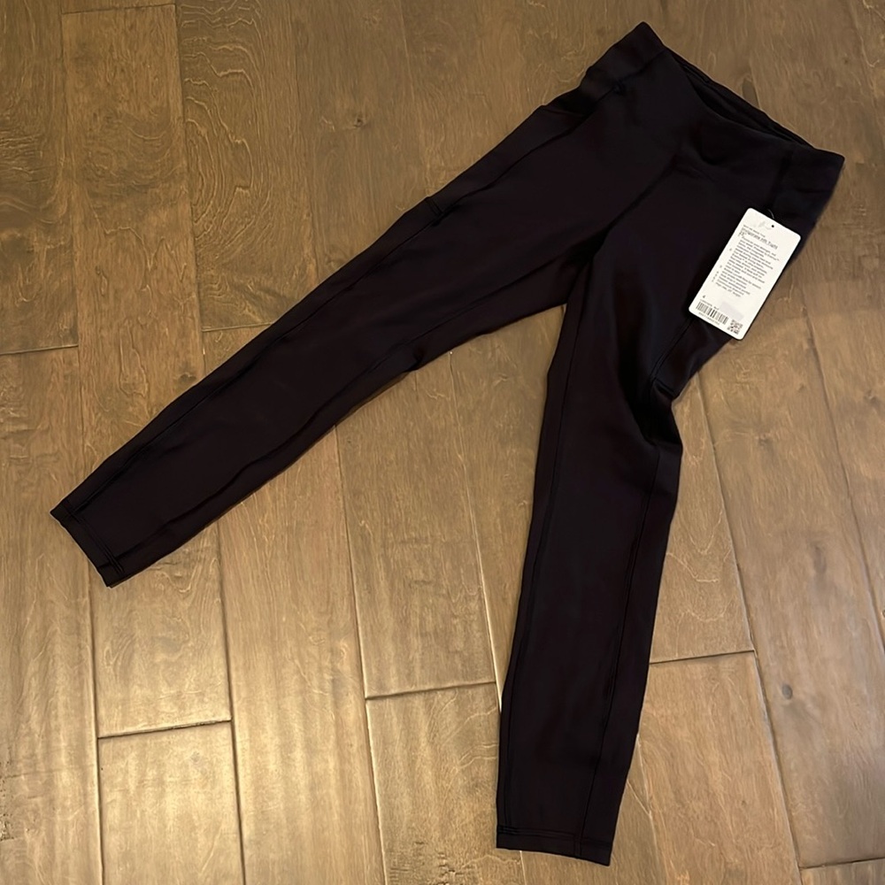 Lululemon Invigorate HR Tight 25” NWT SIZE 4 black leggings with side pockets